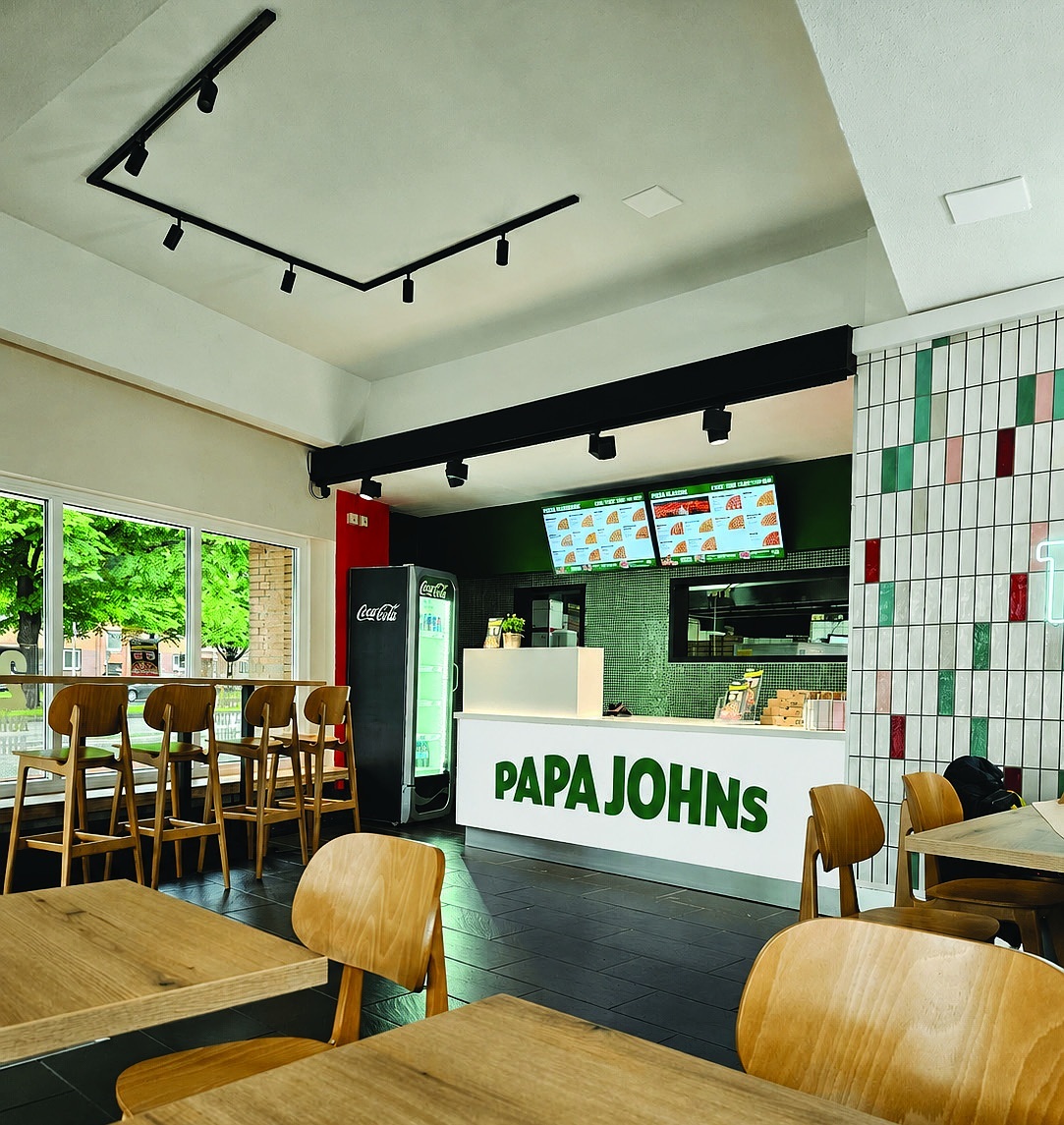 Papa Johns Store Innenraum mit Theke und Sitzbereich